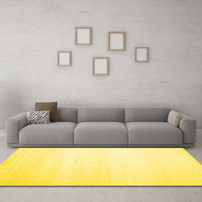 Machine Washable Solid Yellow Modern Rug in a Living Room, wshcon1466yw