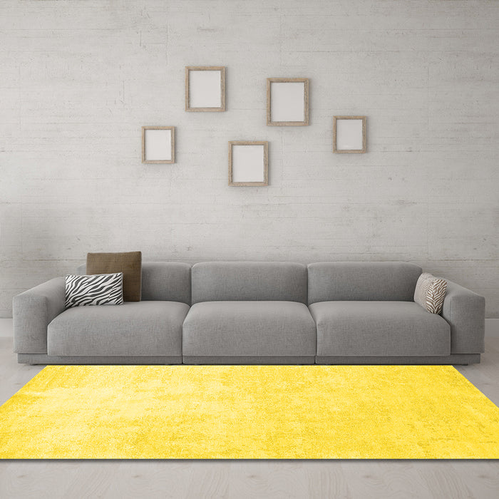 Machine Washable Solid Yellow Modern Rug in a Living Room, wshcon1472yw