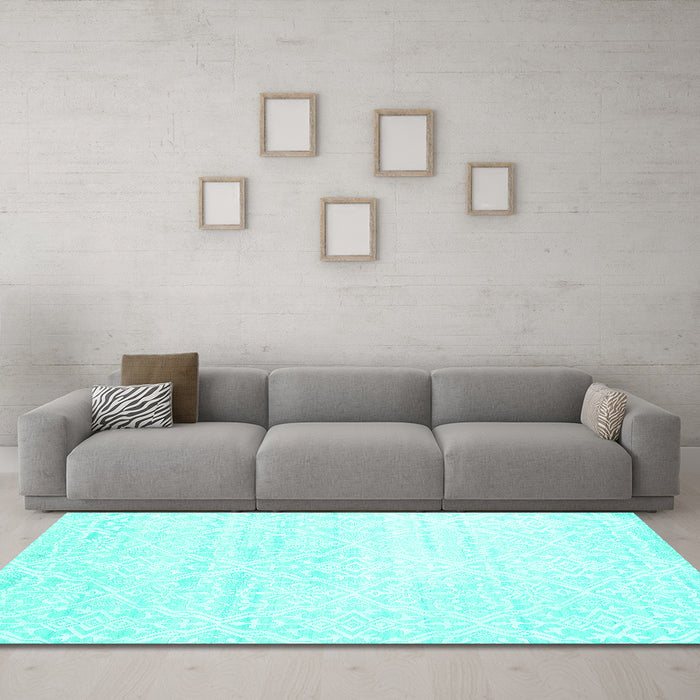 Machine Washable Solid Turquoise Modern Area Rugs in a Living Room,, wshcon1474turq