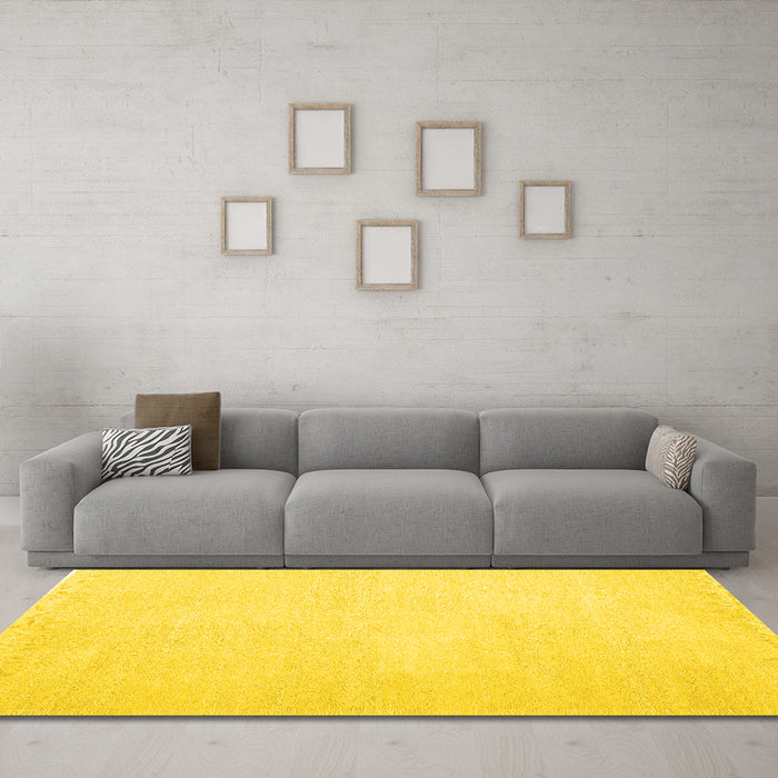 Machine Washable Solid Yellow Modern Rug in a Living Room, wshcon1478yw