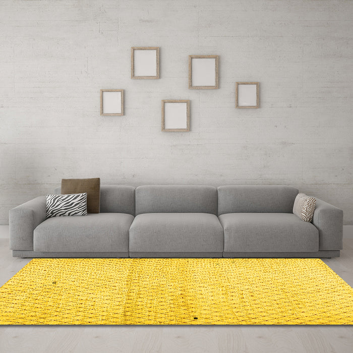Machine Washable Solid Yellow Modern Rug in a Living Room, wshcon1487yw