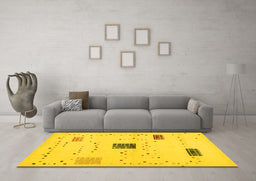 Machine Washable Solid Yellow Modern Rug in a Living Room, wshcon1495yw