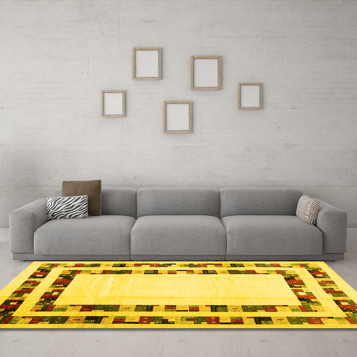 Machine Washable Solid Yellow Modern Rug in a Living Room, wshcon1514yw