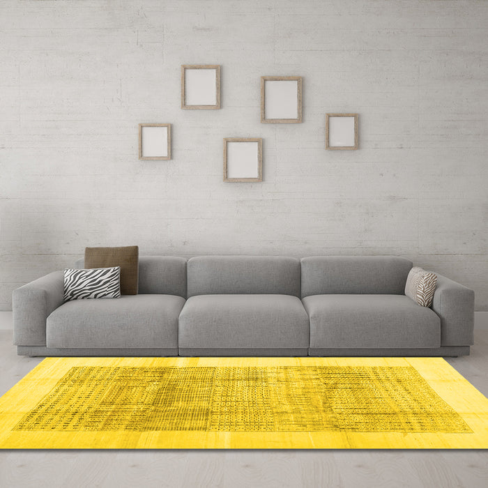 Machine Washable Solid Yellow Modern Rug in a Living Room, wshcon1517yw