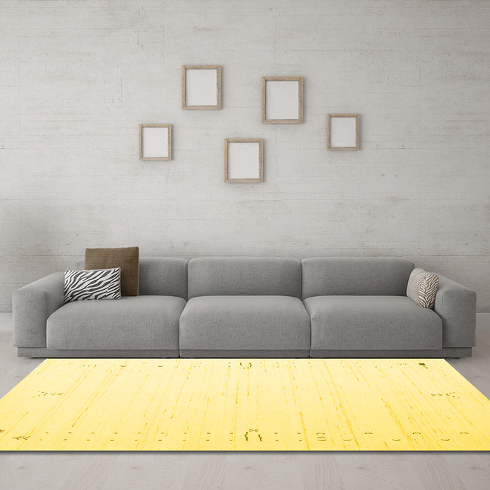 Machine Washable Solid Yellow Modern Rug in a Living Room, wshcon152yw