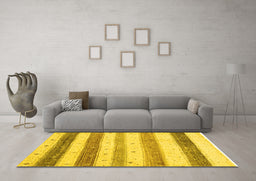 Machine Washable Solid Yellow Modern Rug in a Living Room, wshcon1552yw