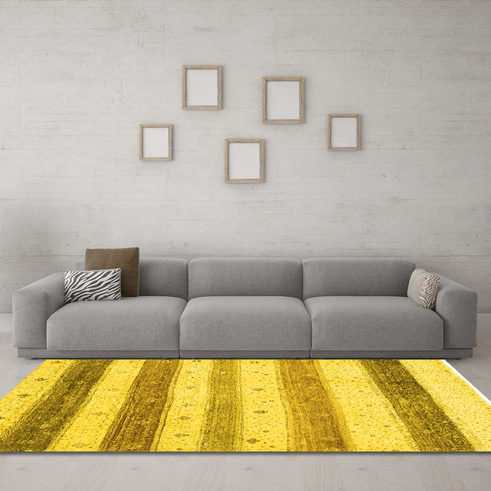 Machine Washable Solid Yellow Modern Rug in a Living Room, wshcon1552yw