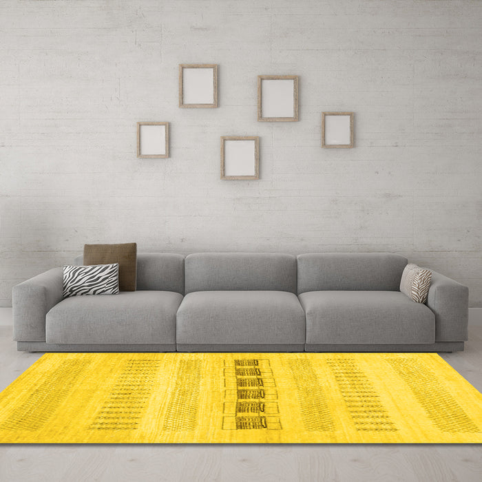 Machine Washable Solid Yellow Modern Rug in a Living Room, wshcon1553yw