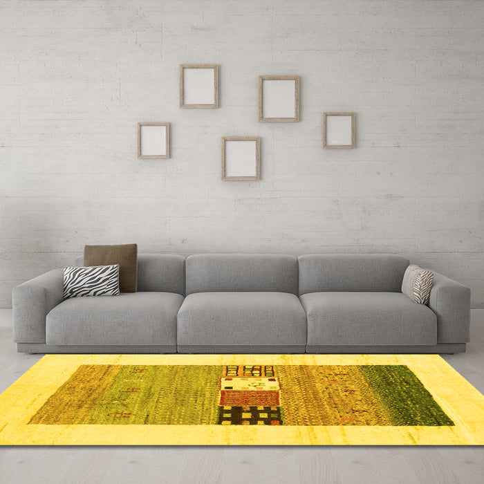 Machine Washable Solid Yellow Modern Rug in a Living Room, wshcon1567yw