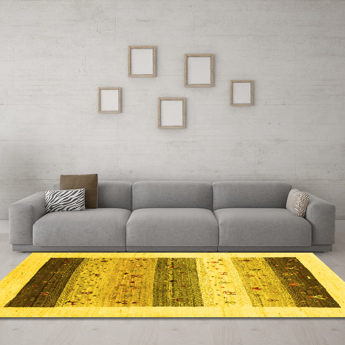 Machine Washable Solid Yellow Modern Rug in a Living Room, wshcon1568yw