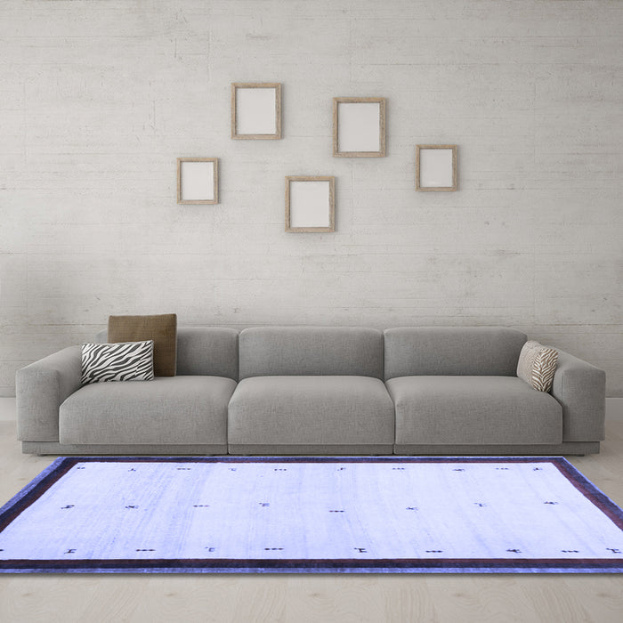 Machine Washable Solid Blue Modern Rug in a Living Room, wshcon1580blu