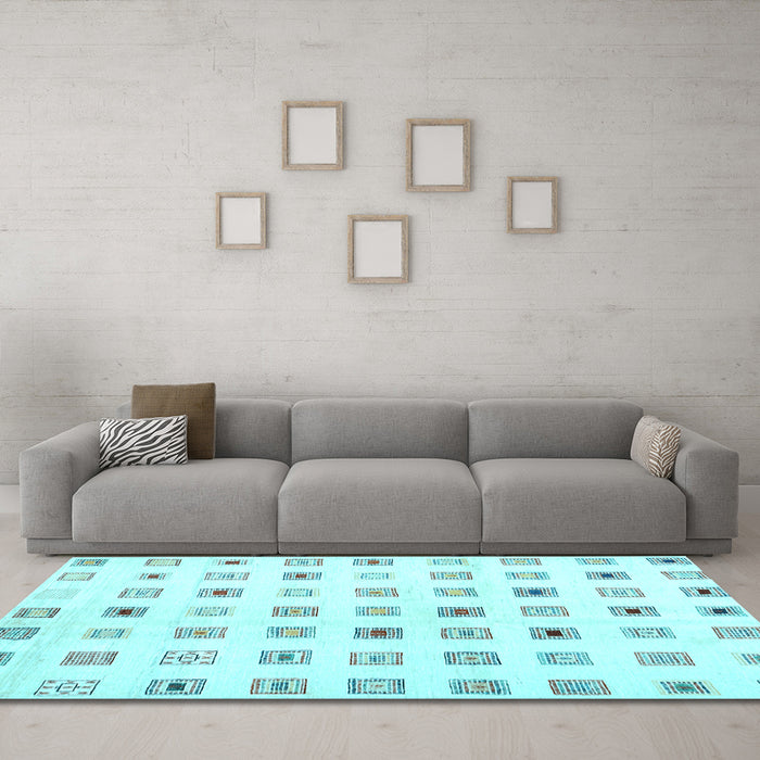 Machine Washable Solid Light Blue Modern Rug in a Living Room, wshcon1597lblu