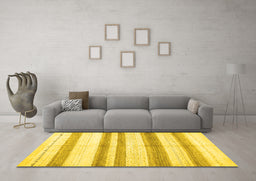 Machine Washable Solid Yellow Modern Rug in a Living Room, wshcon1611yw