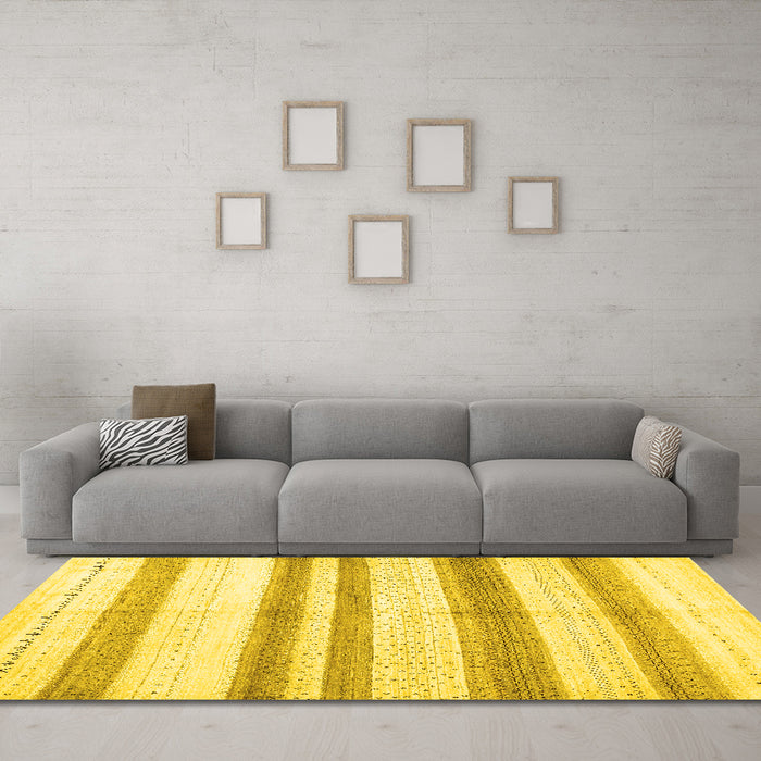 Machine Washable Solid Yellow Modern Rug in a Living Room, wshcon1611yw