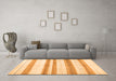 Machine Washable Solid Orange Modern Area Rugs in a Living Room, wshcon1611org