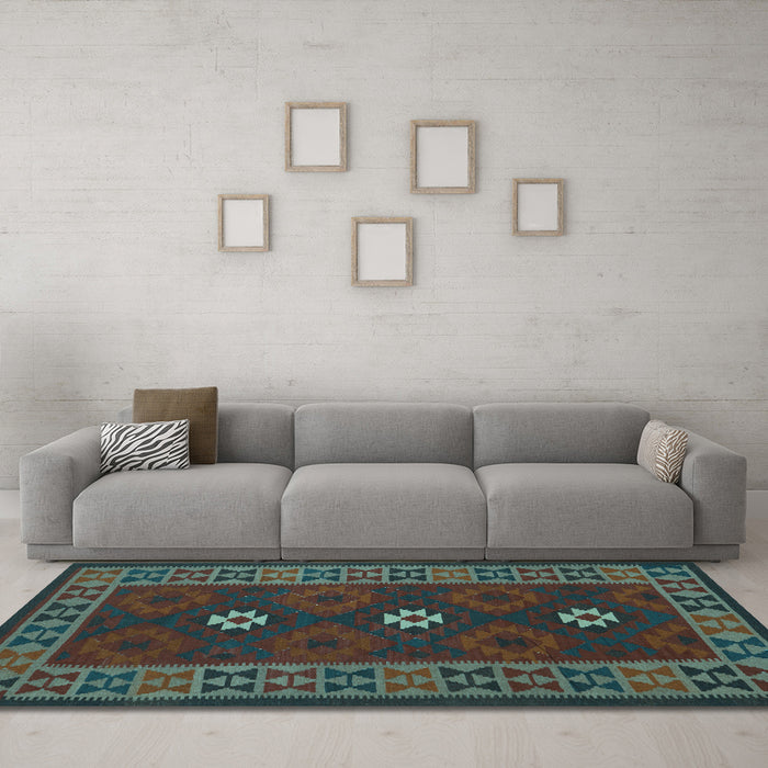 Machine Washable Oriental Light Blue Traditional Rug in a Living Room, wshcon1630lblu