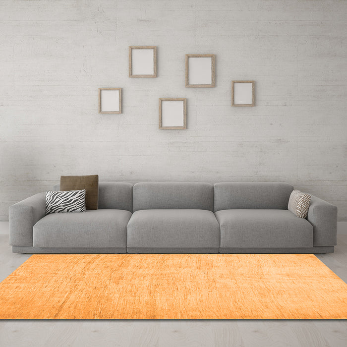 Machine Washable Solid Orange Modern Area Rugs in a Living Room, wshcon1631org