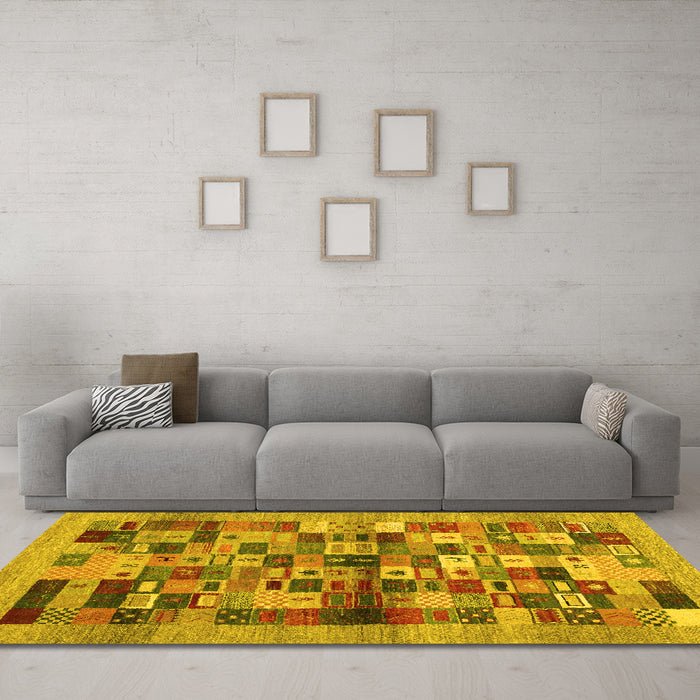 Machine Washable Abstract Yellow Contemporary Rug in a Living Room, wshcon1636yw
