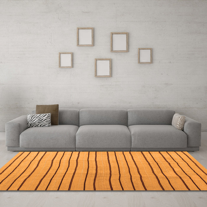 Machine Washable Solid Orange Modern Area Rugs in a Living Room, wshcon1643org