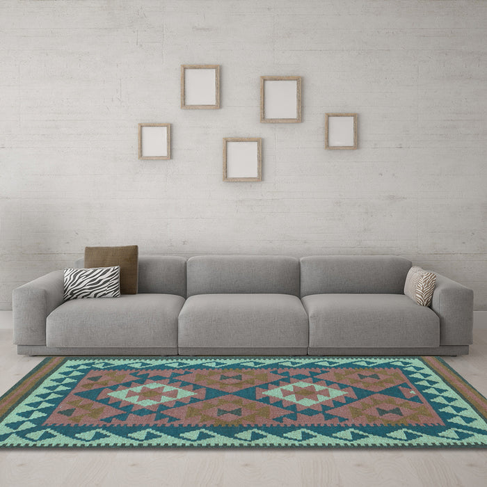 Machine Washable Oriental Light Blue Traditional Rug in a Living Room, wshcon1646lblu