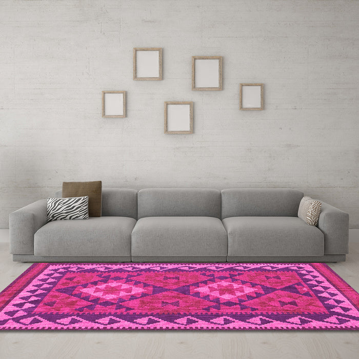 Machine Washable Oriental Pink Traditional Rug in a Living Room, wshcon1646pnk