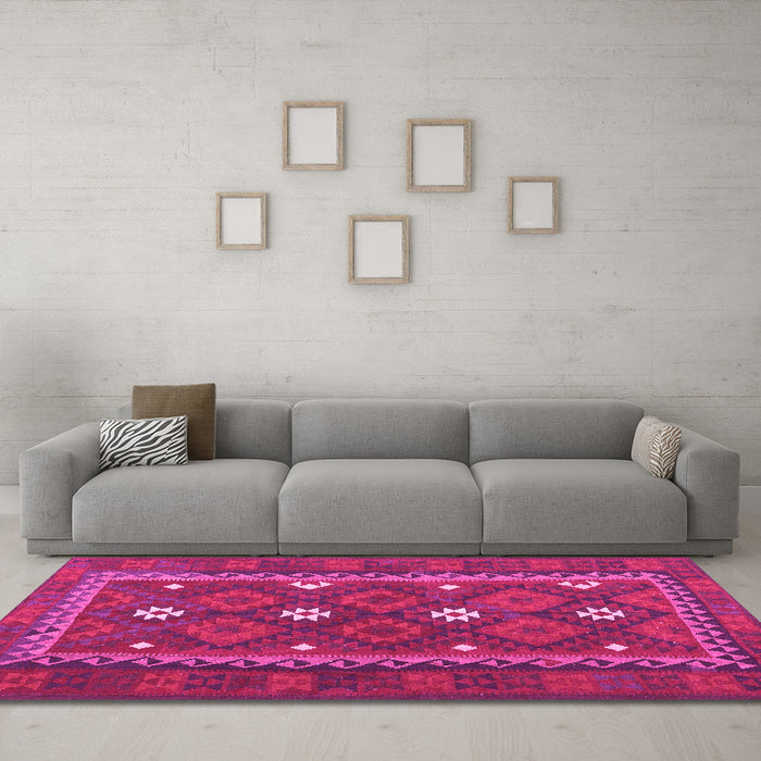 Machine Washable Oriental Pink Traditional Rug in a Living Room, wshcon1649pnk