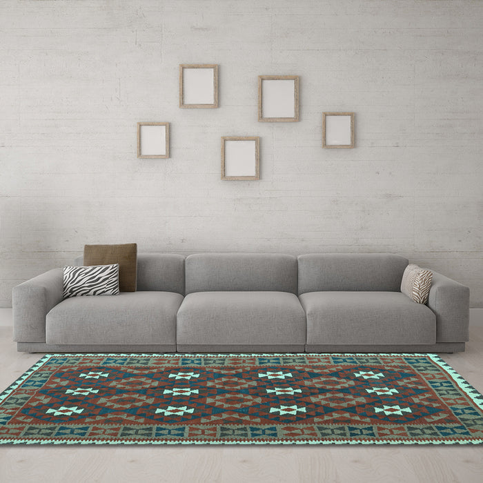 Machine Washable Oriental Light Blue Traditional Rug in a Living Room, wshcon1650lblu