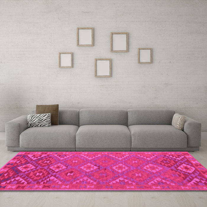 Machine Washable Oriental Pink Traditional Rug in a Living Room, wshcon1653pnk