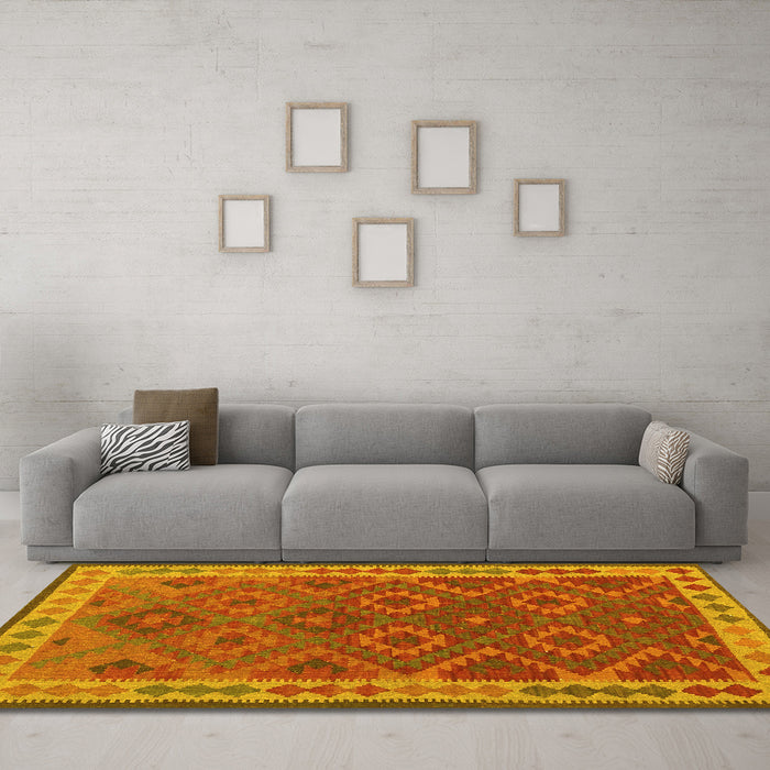 Machine Washable Oriental Yellow Traditional Rug in a Living Room, wshcon1654yw