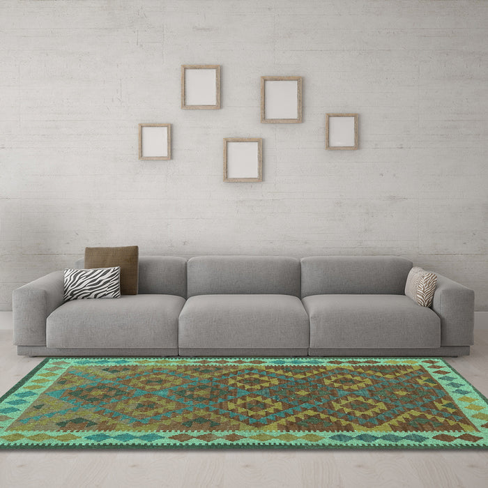 Machine Washable Oriental Turquoise Traditional Area Rugs in a Living Room,, wshcon1654turq