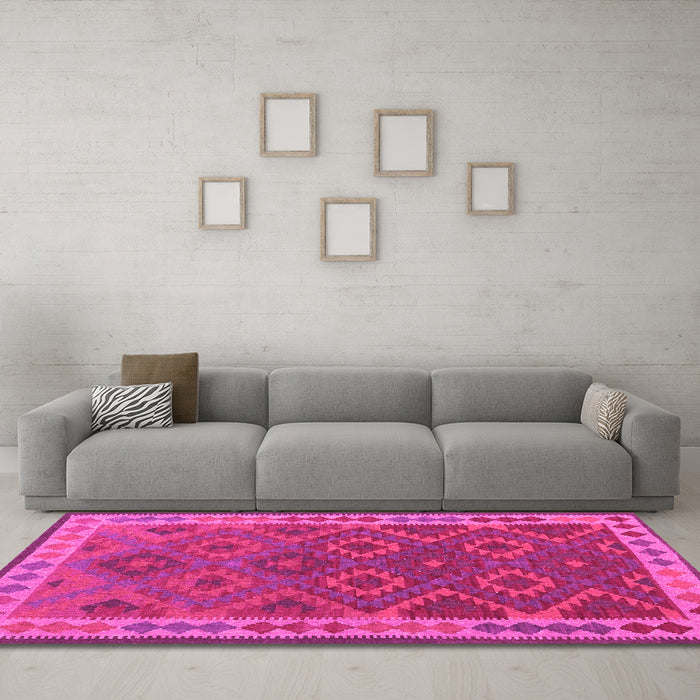 Machine Washable Oriental Pink Traditional Rug in a Living Room, wshcon1654pnk