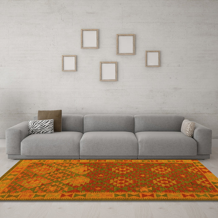 Machine Washable Oriental Yellow Traditional Rug in a Living Room, wshcon1655yw