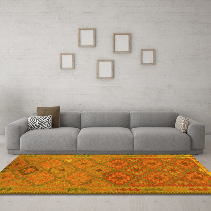 Machine Washable Oriental Yellow Traditional Rug in a Living Room, wshcon1656yw