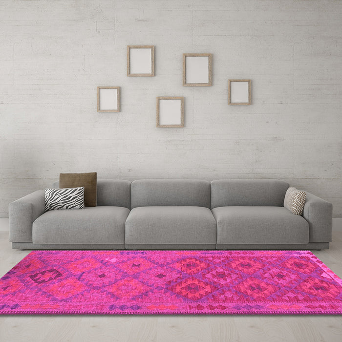 Machine Washable Oriental Pink Traditional Rug in a Living Room, wshcon1656pnk
