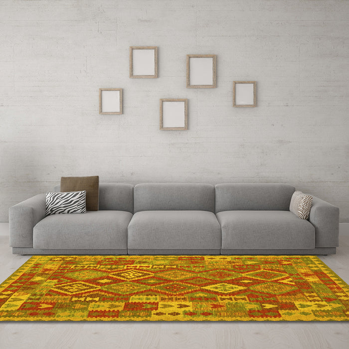 Machine Washable Oriental Yellow Traditional Rug in a Living Room, wshcon1673yw