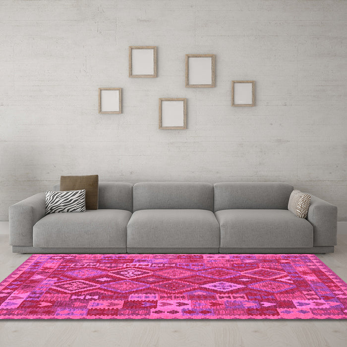 Machine Washable Oriental Pink Traditional Rug in a Living Room, wshcon1673pnk