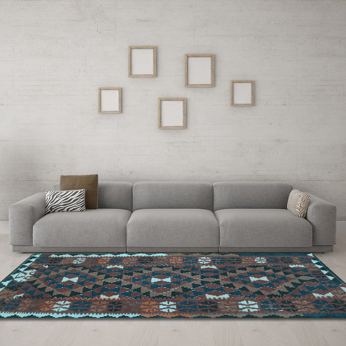 Machine Washable Oriental Light Blue Traditional Rug in a Living Room, wshcon1690lblu