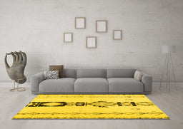 Machine Washable Solid Yellow Modern Rug in a Living Room, wshcon1712yw