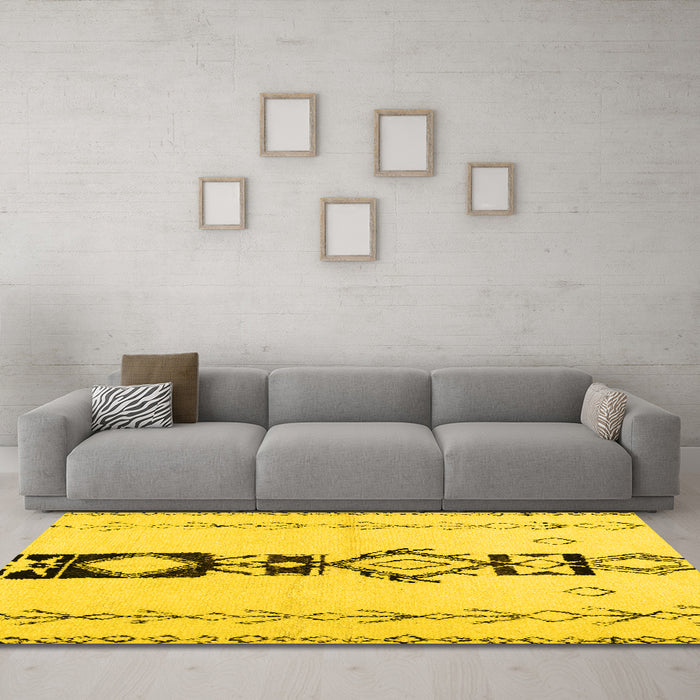 Machine Washable Solid Yellow Modern Rug in a Living Room, wshcon1712yw
