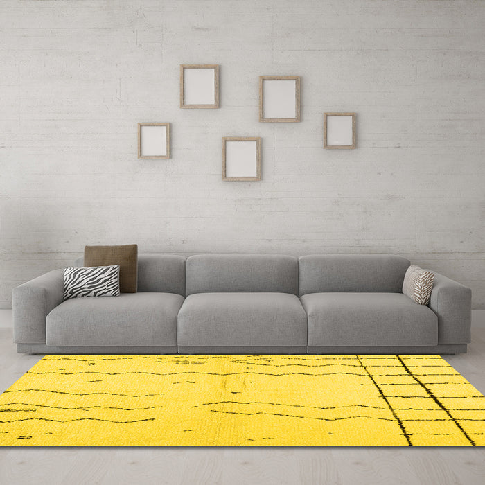 Machine Washable Solid Yellow Modern Rug in a Living Room, wshcon1713yw
