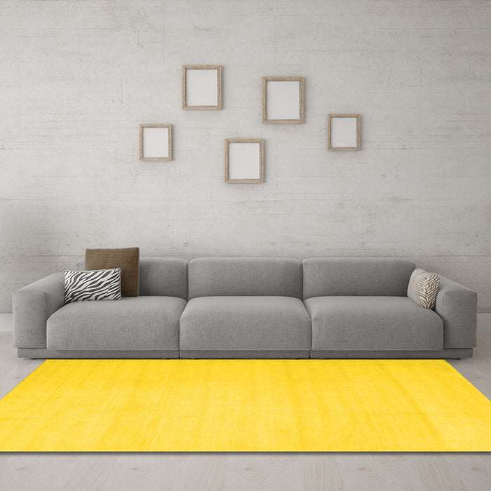 Machine Washable Solid Yellow Modern Rug in a Living Room, wshcon172yw
