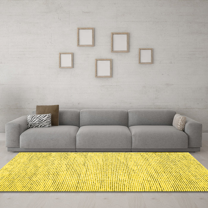 Machine Washable Abstract Yellow Contemporary Rug in a Living Room, wshcon1744yw