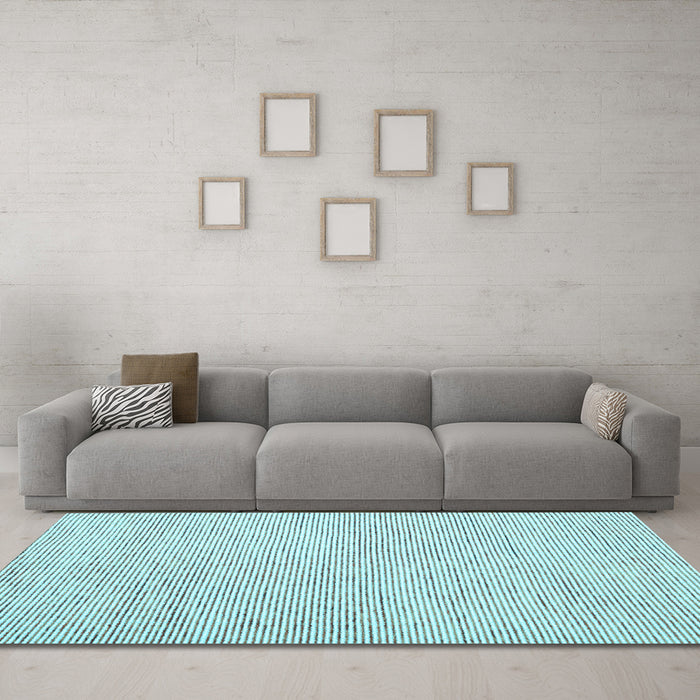 Machine Washable Abstract Light Blue Contemporary Rug in a Living Room, wshcon1748lblu