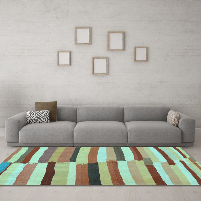 Machine Washable Oriental Light Blue Traditional Rug in a Living Room, wshcon1756lblu