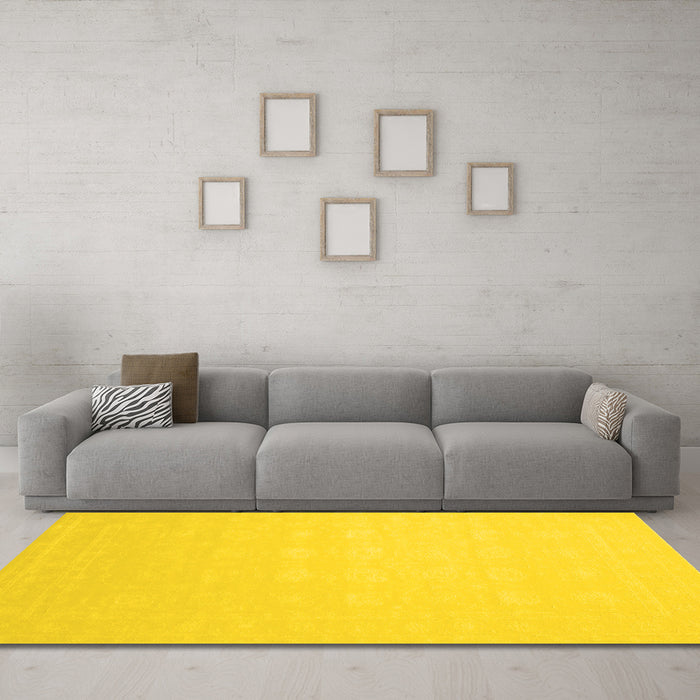Machine Washable Solid Yellow Modern Rug in a Living Room, wshcon176yw