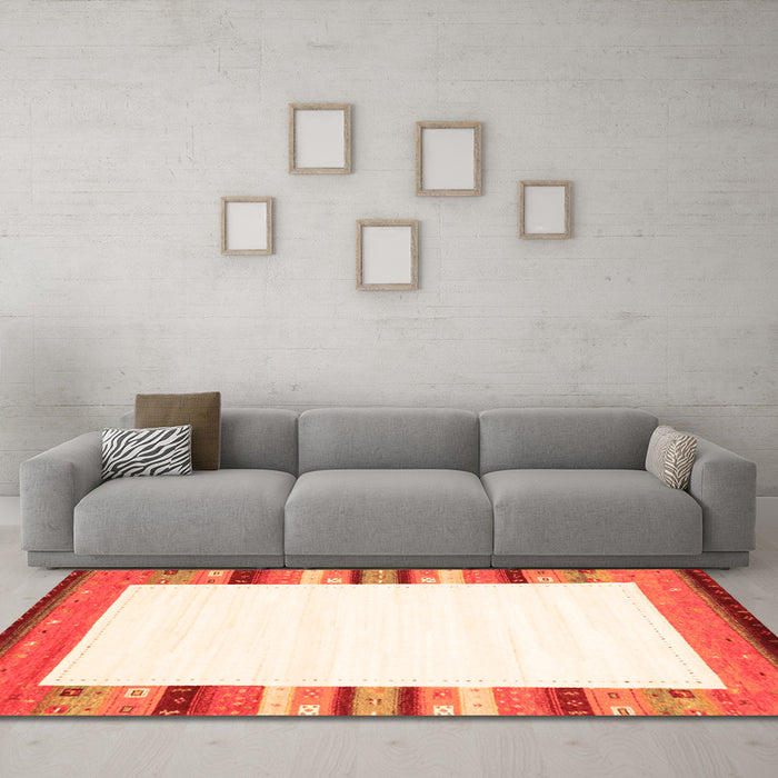 Machine Washable Solid Orange Modern Area Rugs in a Living Room, wshcon1772org