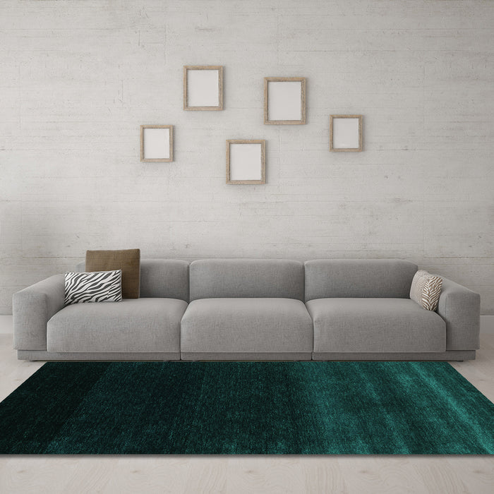 Machine Washable Abstract Turquoise Contemporary Area Rugs in a Living Room,, wshcon1779turq
