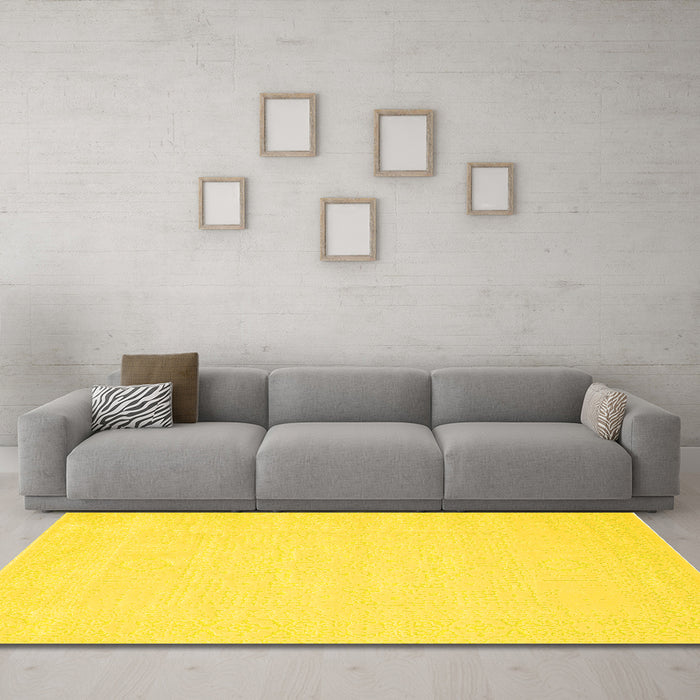 Machine Washable Solid Yellow Modern Rug in a Living Room, wshcon178yw