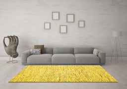 Machine Washable Solid Yellow Modern Rug in a Living Room, wshcon1852yw