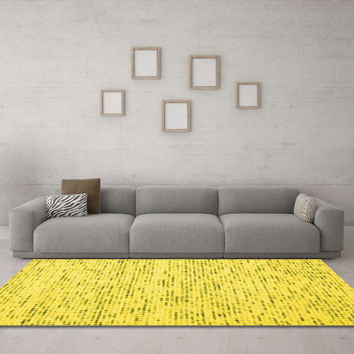 Machine Washable Solid Yellow Modern Rug in a Living Room, wshcon1857yw